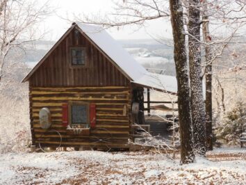 Aunt Phoebe's Perch Log Cabin in snow